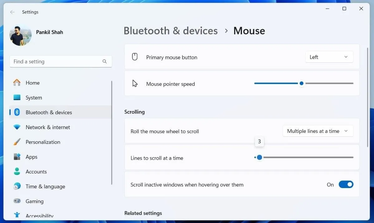 Giao diện cài đặt cuộn chuột trong Windows 11, hiển thị tùy chọn 'Lines to scroll at a time' để điều chỉnh độ nhạy con lăn.