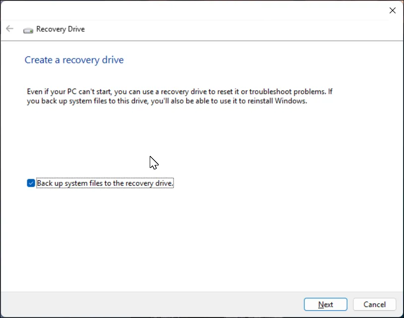 Giao diện ứng dụng &quot;Tạo ổ đĩa khôi phục&quot; trong Windows 11, hiển thị tùy chọn sao lưu tệp hệ thống.