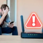 Hình ảnh một router Wi-Fi với biểu tượng cảnh báo và người dùng đang gặp sự cố kết nối.