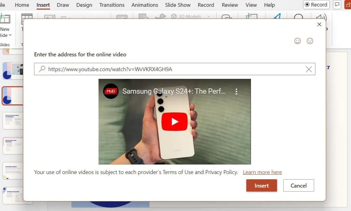 Hộp thoại Online Video trong PowerPoint với URL của video YouTube được dán sẵn để chèn video trực tuyến.