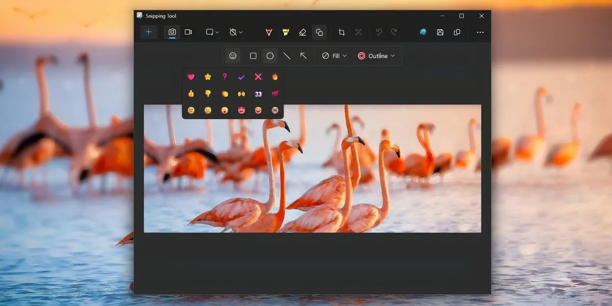 Menu chọn biểu tượng cảm xúc (emoji) trong tùy chọn &quot;Hình dạng&quot; của Snipping Tool trên Windows 11, cho phép thêm emoji vào ảnh chụp màn hình.