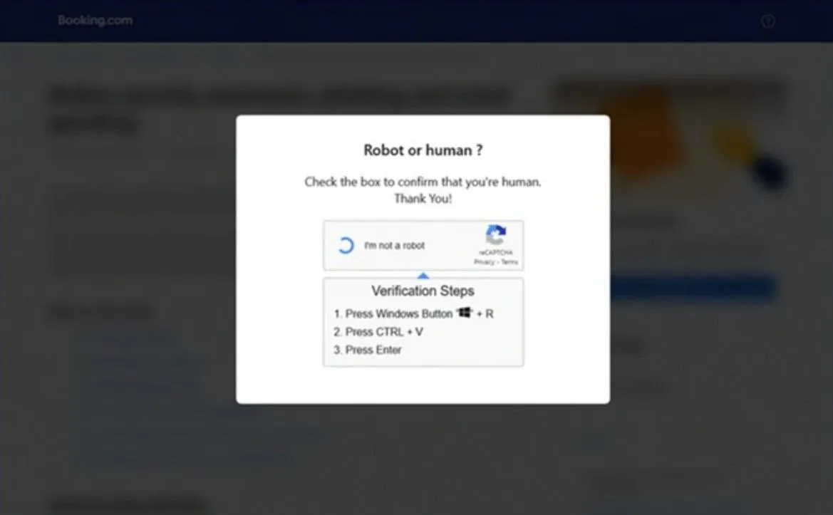 Minh họa trang CAPTCHA giả mạo của chiến dịch lừa đảo Booking.com theo phân tích của Microsoft