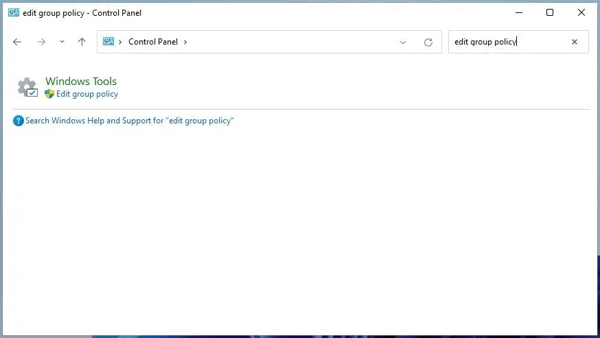 Mở Group Policy Editor qua Control Panel hoặc Settings