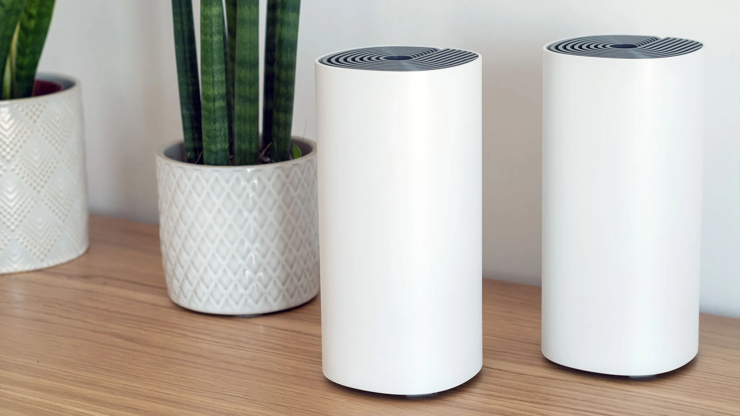 Nhiều bộ định tuyến Wi-Fi Mesh hoạt động cùng nhau tạo mạng liền mạch.