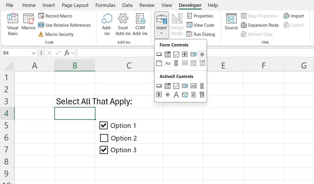 Tab Developer trong Microsoft Excel với các tùy chọn điều khiển biểu mẫu như hộp kiểm (checkboxes) đang hiển thị