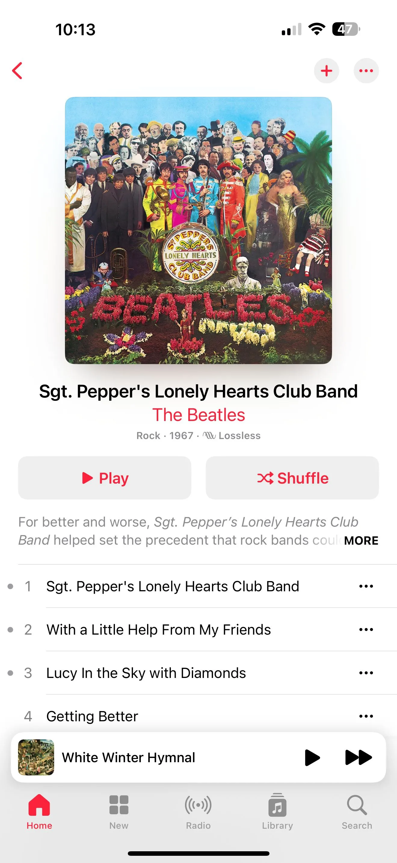 Trang album nhạc trong Apple Music với tùy chọn tạo đài phát.